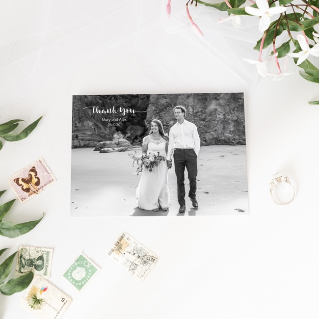 landscape postcard with black and white photo of bride and groom below words "Thank You"
