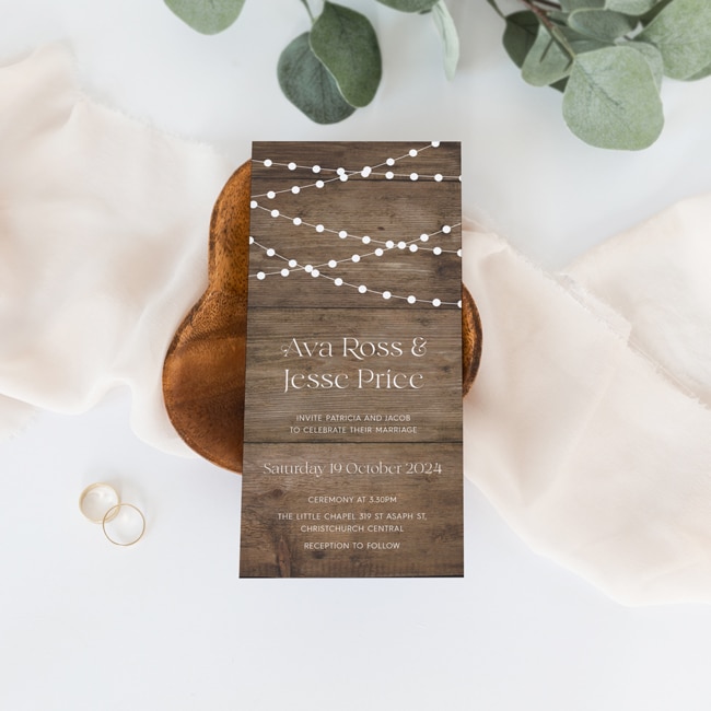 wooden country look fairy lights wedding invitation