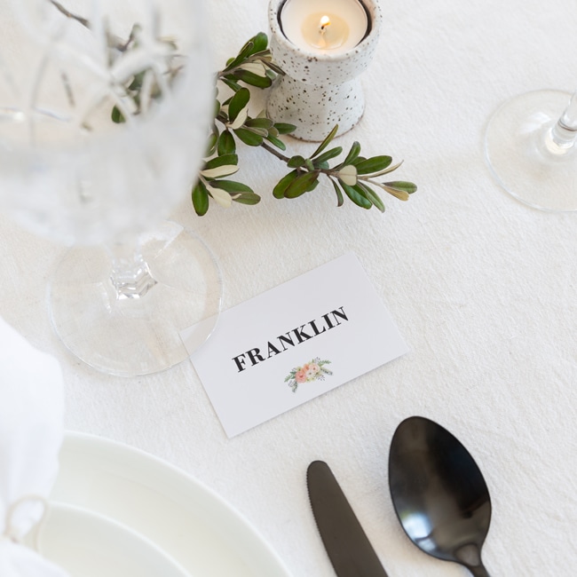 Placecard with twine through holpunch around napkin