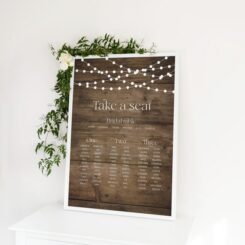 poster in white frame with floral decorations