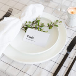 flat placecard on a dinner plate