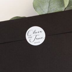 sticker on back of black envelope close up