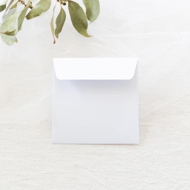 small square white envelope