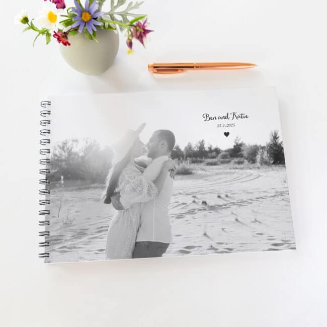 guestbook with black spine and black and white photo