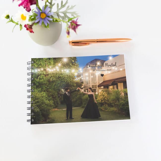guestbook with black spine and black and white photo