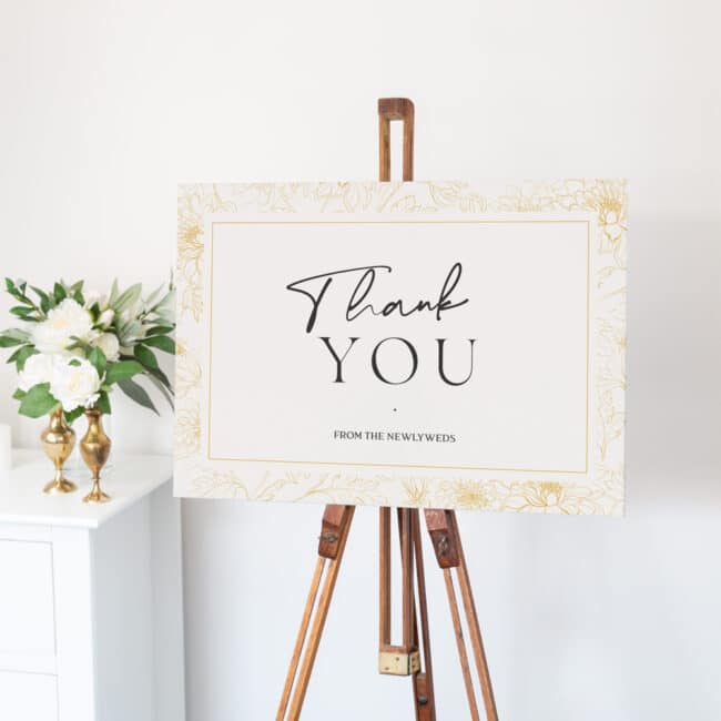 canvas sign on wooden easel