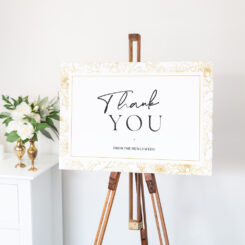 canvas sign on wooden easel